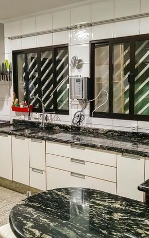 Casa à venda com 140m², 3 quartos e 2 vagas Casa à venda com 140m², 3 quartos e 2 vagasCozinha