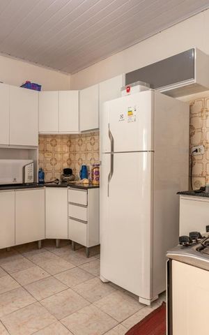 Casa à venda com 70m², 2 quartos e 3 vagas Casa à venda com 70m², 2 quartos e 3 vagasCozinha casa 2