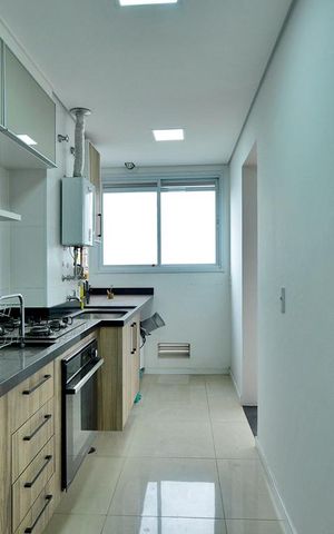 Apartamento à venda com 60m², 2 quartos e 1 vagaCozinha e Área de Serviço