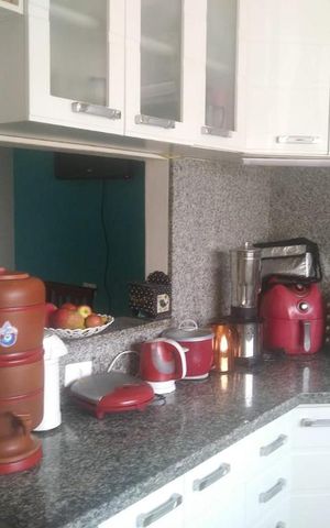 Casa à venda com 128m², 3 quartos e 3 vagas Casa à venda com 128m², 3 quartos e 3 vagasCozinha