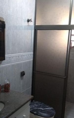 Casa à venda com 400m², 3 quartos e 5 vagas Casa à venda com 400m², 3 quartos e 5 vagasBanheiro 2
