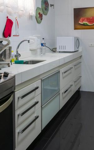 Casa de condomínio à venda com 380m², 3 quartos e 3 vagas1o. Andar - Cozinha