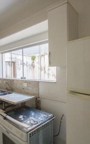 Casa de condomínio para alugar com 490m², 3 quartos e 4 vagasCozinha