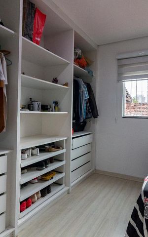 Casa à venda com 385m², 4 quartos e 2 vagasQuarto 3 suíte
