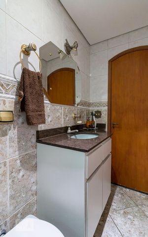Casa à venda com 385m², 4 quartos e 2 vagasBanheiro quarto 4 suíte