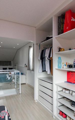 Casa à venda com 385m², 4 quartos e 2 vagasQuarto 3 suíte