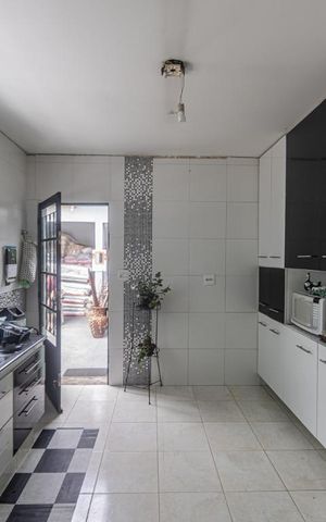 Casa à venda com 125m², 3 quartos e 2 vagas Casa à venda com 125m², 3 quartos e 2 vagasCozinha