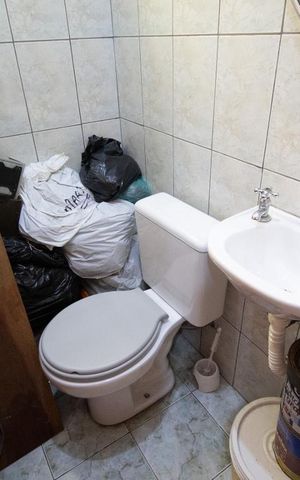 Casa à venda com 174m², 4 quartos e 2 vagasBanheiro