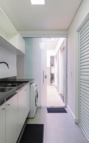 Casa à venda com 215m², 3 quartos e 2 vagas1o. Andar - Área de serviço
