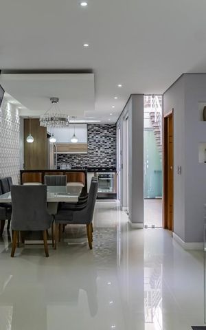 Casa à venda com 215m², 3 quartos e 2 vagas1o. Andar - Sala