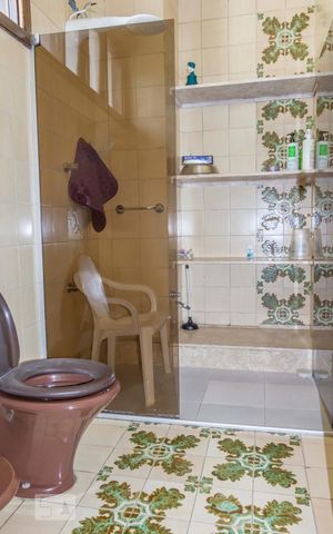 Casa à venda com 436m², 4 quartos e 4 vagasBanheiro 5