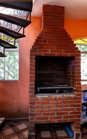Casa à venda com 337m², 3 quartos e 2 vagas1o. Andar - Churrasqueira