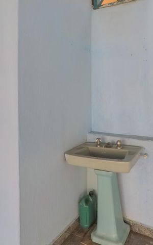 Casa à venda com 70m², 1 quarto e 1 vagaBanheiro na garagem