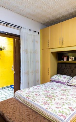 Casa à venda com 70m², 2 quartos e 2 vagas Casa à venda com 70m², 2 quartos e 2 vagasSuíte