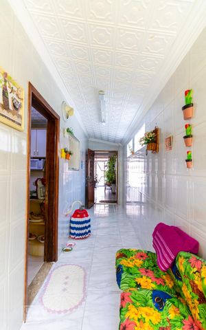 Casa à venda com 70m², 2 quartos e 2 vagas Casa à venda com 70m², 2 quartos e 2 vagasCorredor
