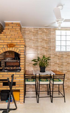 Casa à venda com 70m², 2 quartos e 2 vagas Casa à venda com 70m², 2 quartos e 2 vagasChurrasqueira
