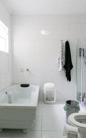 Casa à venda com 298m², 3 quartos e 8 vagasBanheiro de Suíte 1