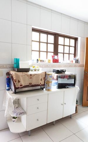 Casa à venda com 150m², 3 quartos e 2 vagas Casa à venda com 150m², 3 quartos e 2 vagasCozinha