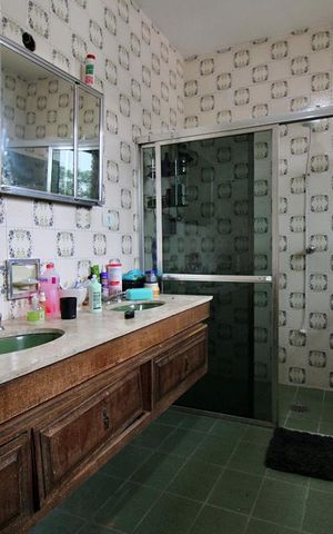Casa à venda com 445m², 4 quartos e sem vagaBanheiro da Suíte 1