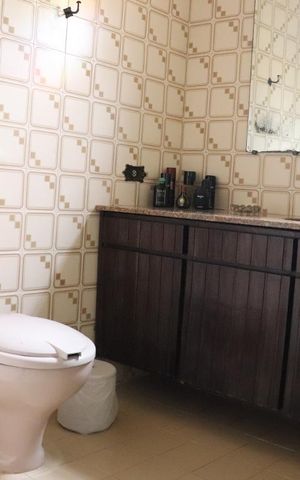 Casa à venda com 420m², 3 quartos e 6 vagasBanheiro da Suíte 1