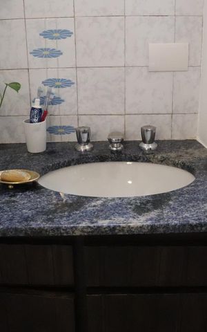 Casa à venda com 420m², 3 quartos e 6 vagasBanheiro da Suíte 2