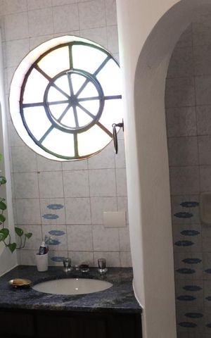 Casa à venda com 420m², 3 quartos e 6 vagasBanheiro da Suíte 2
