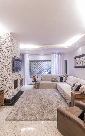 Casa à venda com 357m², 4 quartos e 4 vagasSala de Estar
