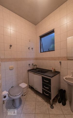 Casa à venda com 357m², 4 quartos e 4 vagasBanheiro de Serviço
