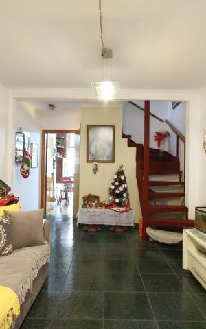 Casa à venda com 110m², 2 quartos e 2 vagasSala