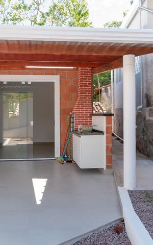 Casa à venda com 36m², 1 quarto e 1 vaga Casa à venda com 36m², 1 quarto e 1 vagaFachada