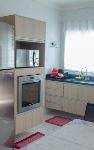 Casa para alugar com 120m², 2 quartos e 2 vagasCozinha