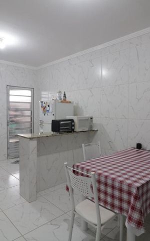 Casa à venda com 127m², 3 quartos e 4 vagas Casa à venda com 127m², 3 quartos e 4 vagasCozinha