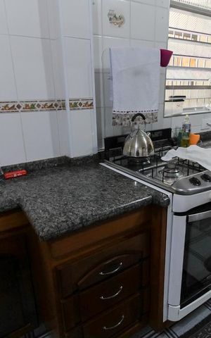 Casa à venda com 150m², 3 quartos e 4 vagas Casa à venda com 150m², 3 quartos e 4 vagasCozinha