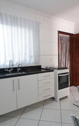 Casa de condomínio à venda com 90m², 3 quartos e 4 vagas Casa de condomínio à venda com 90m², 3 quartos e 4 vagasCozinha