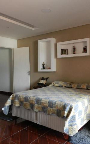 Casa à venda com 250m², 4 quartos e 2 vagasQuarto 1 - Suíte 