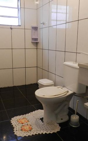 Casa à venda com 250m², 4 quartos e 2 vagasBanheiro