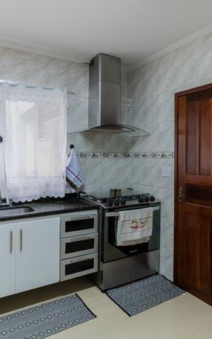 Casa à venda com 95m², 3 quartos e 2 vagas Casa à venda com 95m², 3 quartos e 2 vagasCozinha
