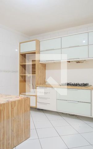 Casa de condomínio para alugar com 150m², 3 quartos e 4 vagasCozinha