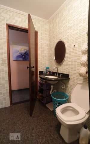 Casa à venda com 200m², 4 quartos e 3 vagas Casa à venda com 200m², 4 quartos e 3 vagasBanheiro 1