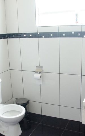 Casa à venda com 130m², 3 quartos e 4 vagasBanheiro da Suíte