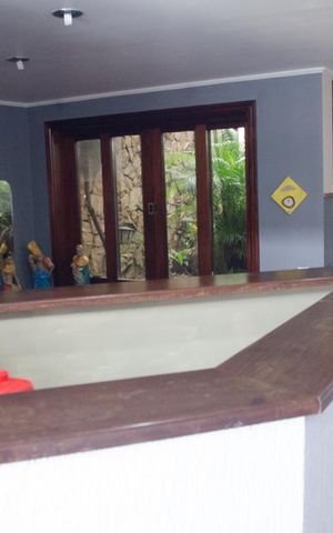 Casa à venda com 432m², 4 quartos e 6 vagasSala