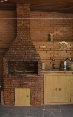 Casa de condomínio à venda com 339m², 4 quartos e 3 vagasChurrasqueira