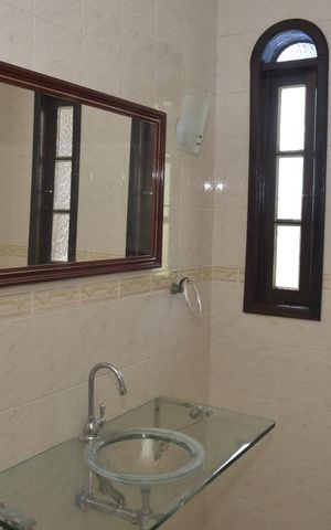 Casa de condomínio à venda com 339m², 4 quartos e 3 vagasBanheiro da Suíte