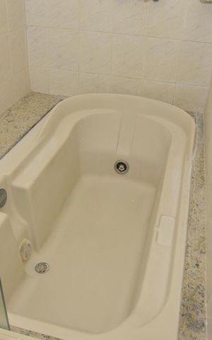 Casa de condomínio à venda com 339m², 4 quartos e 3 vagasBanheiro da Suíte