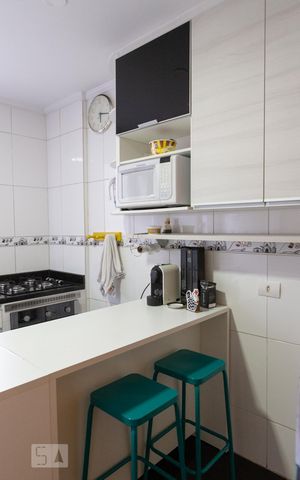 Apartamento à venda com 57m², 2 quartos e 1 vaga Apartamento à venda com 57m², 2 quartos e 1 vagaCozinha