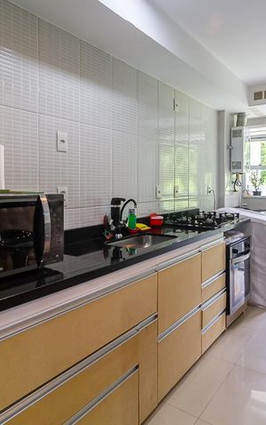 Apartamento à venda com 77m², 3 quartos e 1 vaga Apartamento à venda com 77m², 3 quartos e 1 vagaCozinha e Área de Serviço