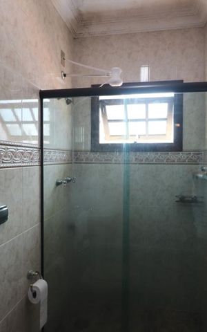 Casa à venda com 233m², 3 quartos e 5 vagasBanheiro da Suíte 1