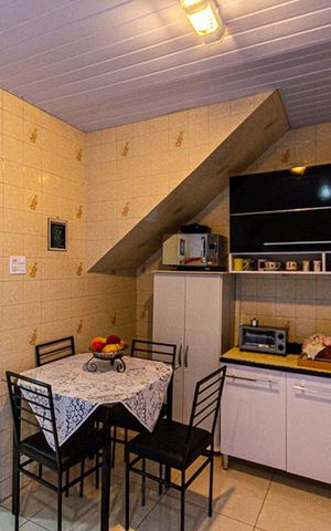 Casa à venda com 100m², 4 quartos e sem vaga Casa à venda com 100m², 4 quartos e sem vagaCozinha