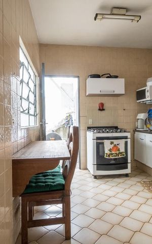 Casa à venda com 133m², 2 quartos e 2 vagas Casa à venda com 133m², 2 quartos e 2 vagasCozinha