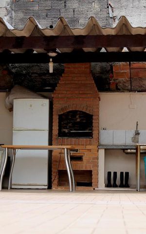 Casa de condomínio à venda com 69m², 2 quartos e 1 vagachurrasqueira